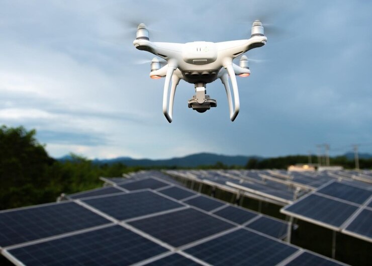 Drone Flying Over Solar Panels